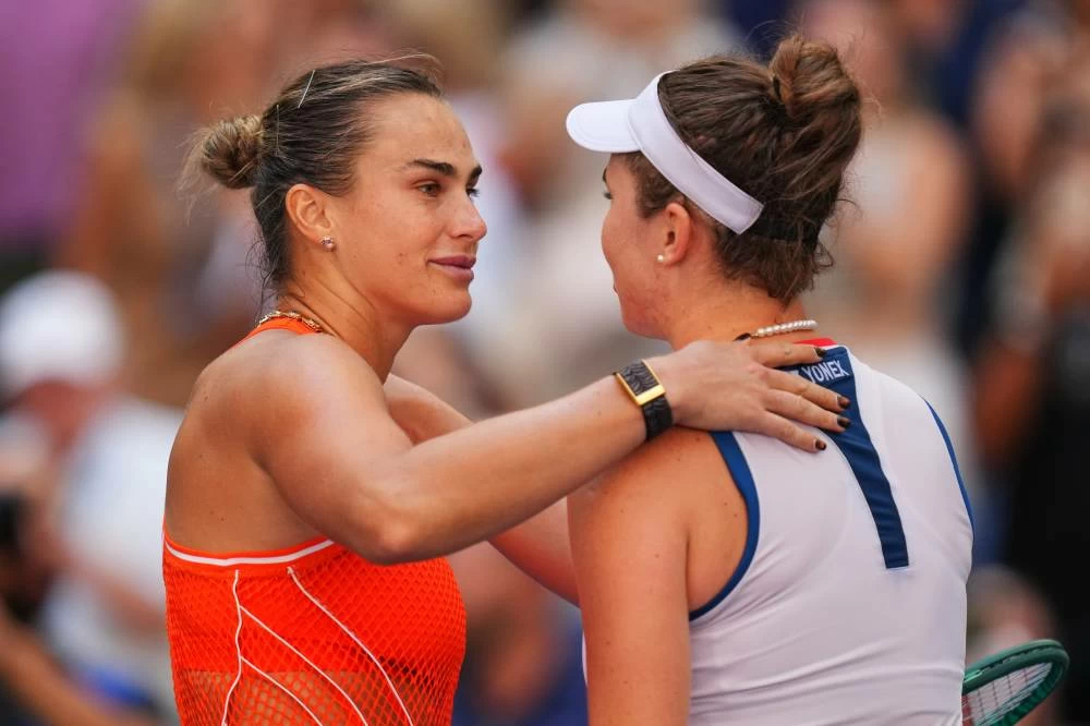 Aryna Sabalenka, of Belarus, left, and Linda Noskova, of the Czech Republic, meet at the net after Sabalenka won a match during the quarterfinal round of the U.S. Open tennis championships, Tuesday, September 8, 2026, in New York.
Photo credit: Kirsty Wigglesworth/AP