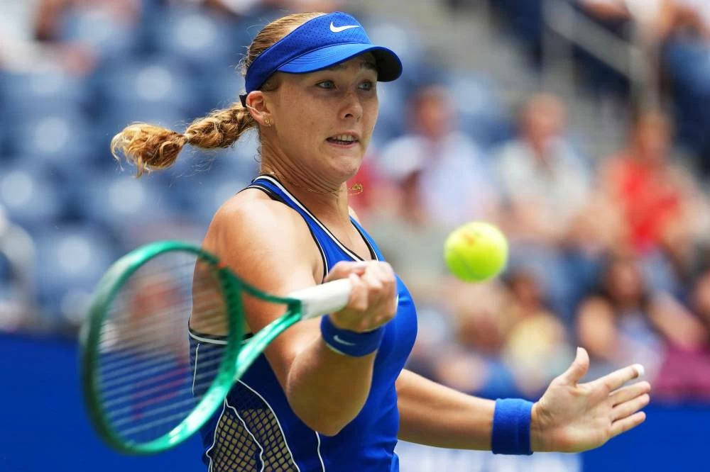 Mirra Andreeva, of Russia, returns the ball to Coco Gauff, of the United States, during the quarterfinal round of the U.S. Open tennis championships, Wednesday, Sept. 9, 2026, in New York. (AP)