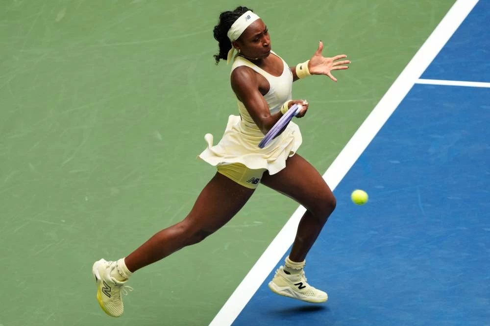 Coco Gauff, of the United States, returns the ball to Mirra Andreeva, of Russia, during the quarterfinal round of the U.S. Open tennis championships, Wednesday, Sept. 9, 2026, in New York. (AP)