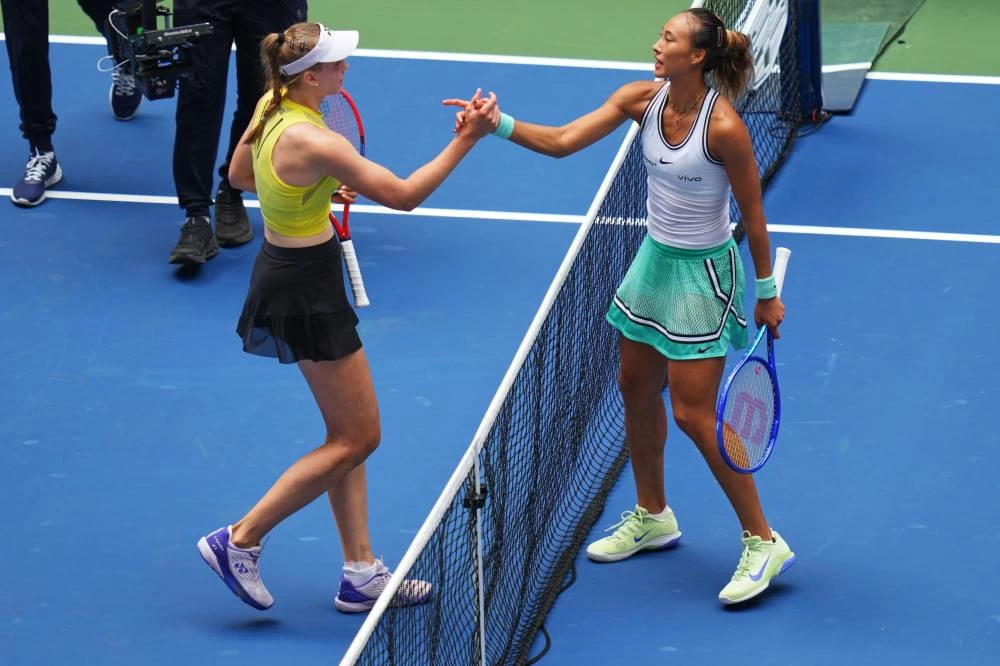 Elena Rybakina, of Kazakhstan, left, and Qinwen Zheng, of China, meet at the net after Rybakina won their match during the quarterfinal round of the U.S. Open tennis championships, Wednesday, Sept. 9, 2026, in New York. (AP)