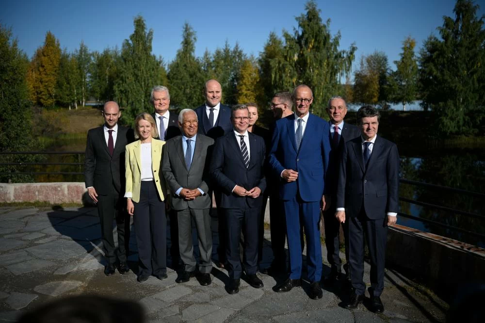 Minister for Europe and Foreign Affairs of France Jean-Noel Barrot, from left, High Representative of the Union for Foreign Affairs, Security Policy Kaja Kallas, President of Lithuania Gitanas Nauseda, President of the European Council António Costa, Prime Minister of Latvia Andris Kulbergs, Finnish Prime Minister Petteri Orpo, Prime Minister of Denmark Mette Frederiksen, Prime Minister of Estonia Kristen Michal, Federal Chancellor of Germany Friedrich Merz, Commissioner for International Partnerships Jozef Síkela and President of Romania Nicușor Dan pose for a family photo during the European Arctic Summit in Rovaniemi, Finland, Monday, Sept. 14, 2026. AP