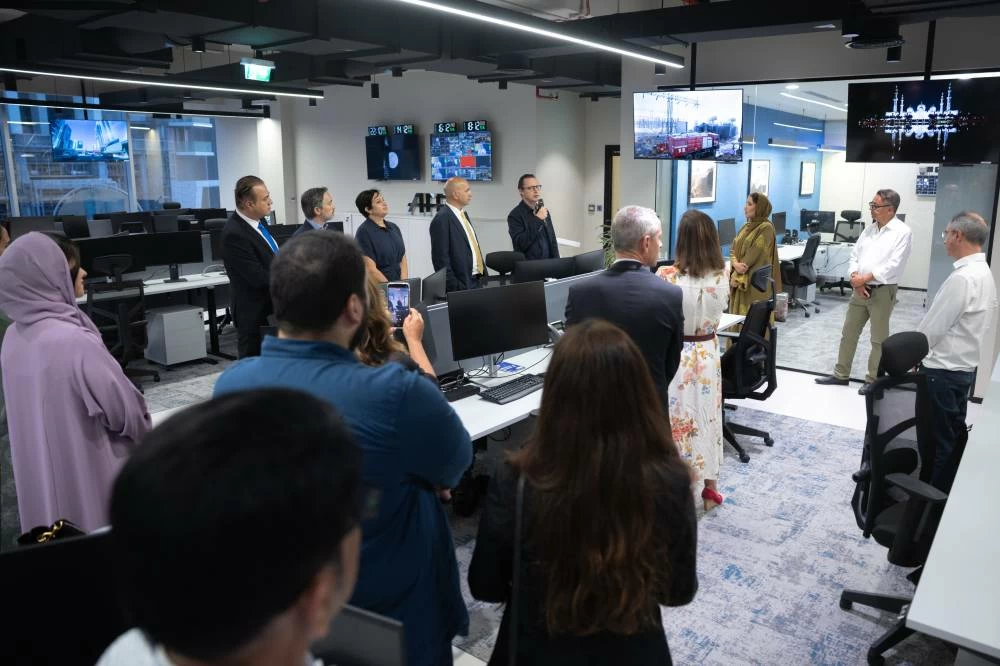 Her Excellency Mona Al Marri toured the expanded office accompanied by Phil Chetwynd, AFP Global News Director, among others. Picture credit: GDMO