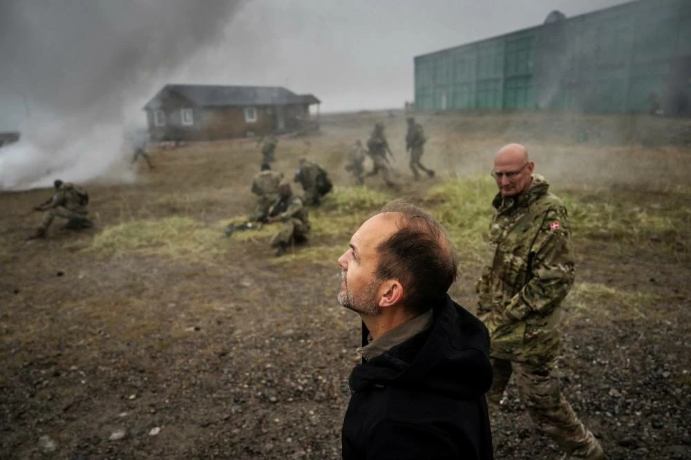 Denmark's Minister of Defense Jeppe Bruus, along with Greenland's Minister for Foreign Affairs Mute B. Egede, visits the NATO military exercise Arctic Shield 2026 in Narsarsuaq, Greenland, on Wednesday, September 9, 2026. (Reuters)
