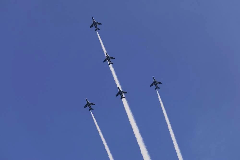 Japan's Air Self-Defense Force (JASDF) Blue Impulse aerobatic team performs during a demonstration flight to commemorate the 20th Asian Games Aichi-Nagoya 2026. (Reuters)