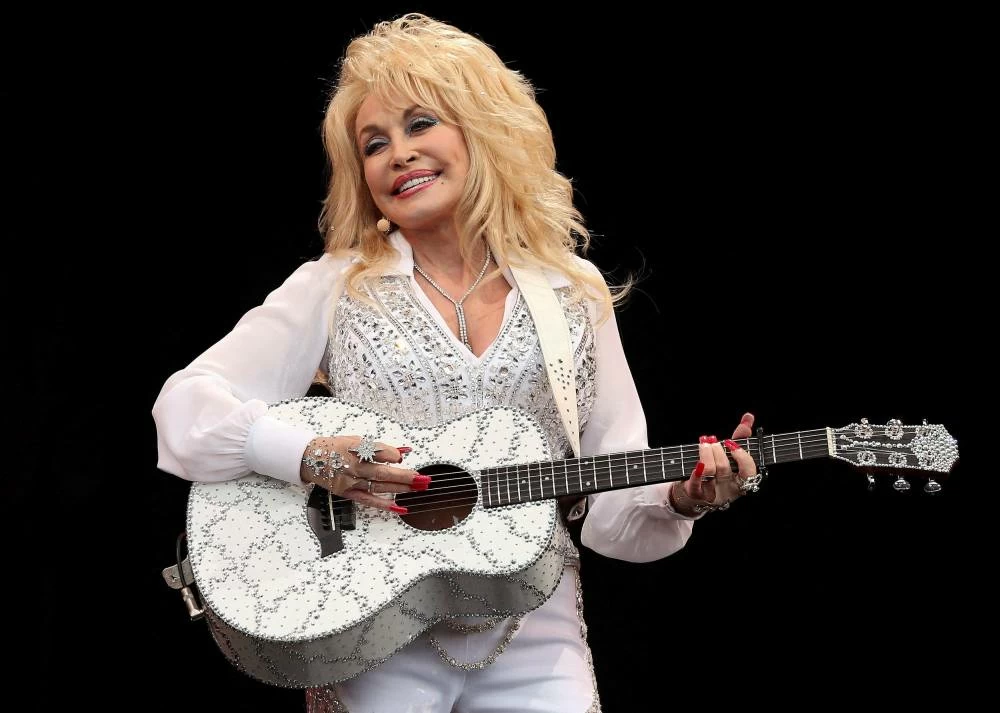 American country music star Dolly Parton performs on the Pyramid Stage at Worthy Farm in Somerset, during the Glastonbury Festival June 29, 2014. Picture credit: Reuters