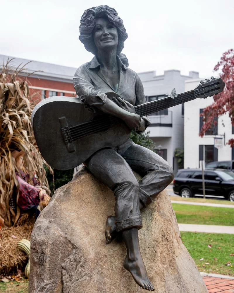 A statue of country music star Dolly Parton outside of the Sevier County Courthouse in downtown Sevierville, Tennessee, U.S., November 3, 2025. Picture credit: Reuters