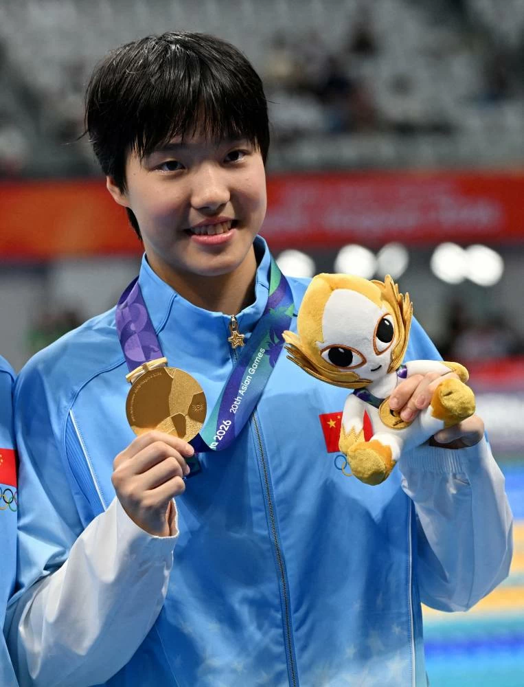 Zidi Yu celebrates after winning the Women's 200m Individual Medley Final  (Reuters)