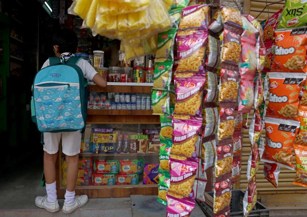 A student inside a grocery shop in Cuttack, Odisha, India, September 18, 2026. (Reuters)