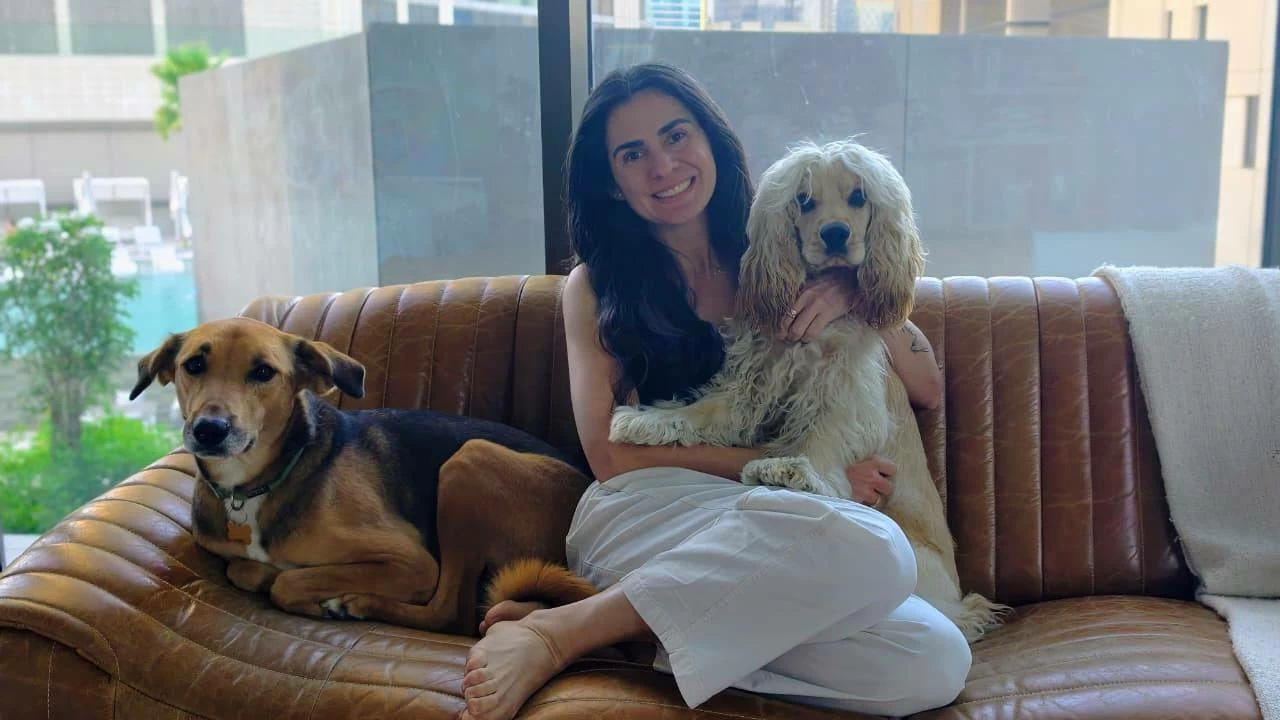 Chef Gabriela Chamorro with her dogs Strotie and Moxy.