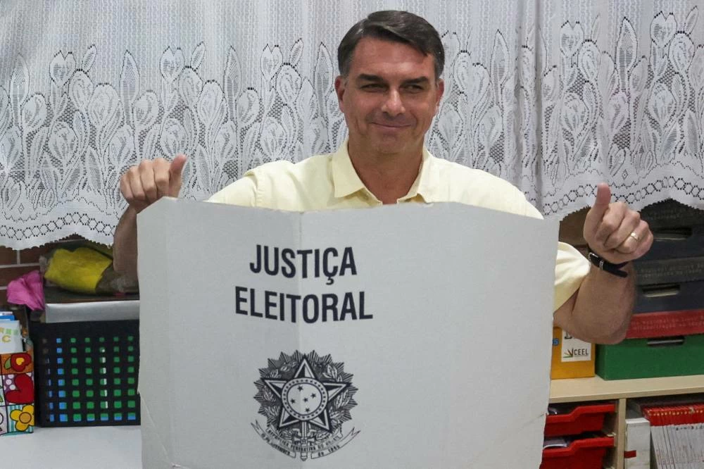 Brazil's presidential candidate Flavio Bolsonaro of the Liberal Party (PL) gestures as he votes during the general election, in Rio de Janeiro, Brazil, October 4, 2026. (Reuters)