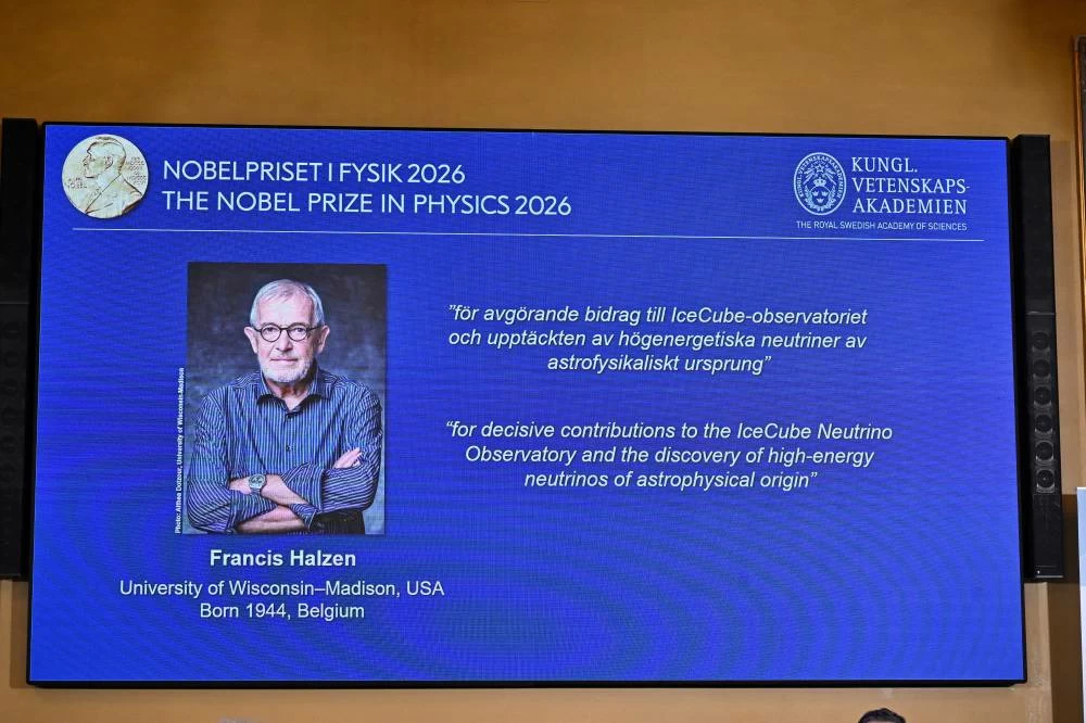 A display board shows that Francis Halzen is announced as the recipient of the 2026 Nobel Prize in Physics during a press conference at the Royal Swedish Academy of Sciences in Stockholm, Sweden, October 6, 2026. TT News Agency/Christine Olsson/ via REUTERS