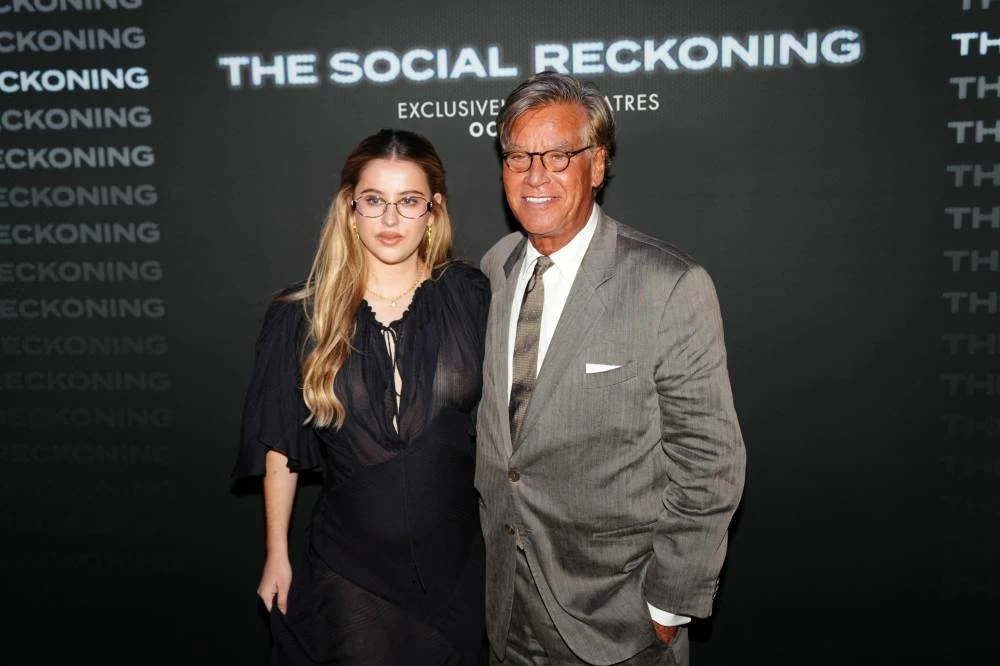 Director, writer, and producer Aaron Sorkin and his daughter, actress Roxy Sophie Sorkin, attend the Premiere of "The Social Reckoning,” in New York City, US, October 4, 2026. REUTERS/Angelina Katsanis