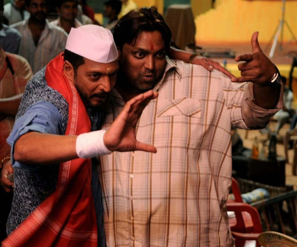 FILE PHOTO: Bollywood actor Nana Patekar (L) and choreographer Ganesh Acharya rehearse during the shooting of their forthcoming film 'Horn OK Please' at a studio in Mumbai March 26, 2008. Picture taken March 26, 2008. (Reuters)