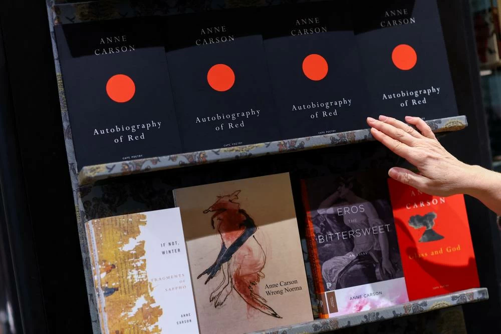 Copies of books by Anne Carson, winner of the 2026 Nobel Prize for Literature, are displayed at Waterstones bookshop in London, Britain, October 8, 2026. REUTERS/Hannah McKay