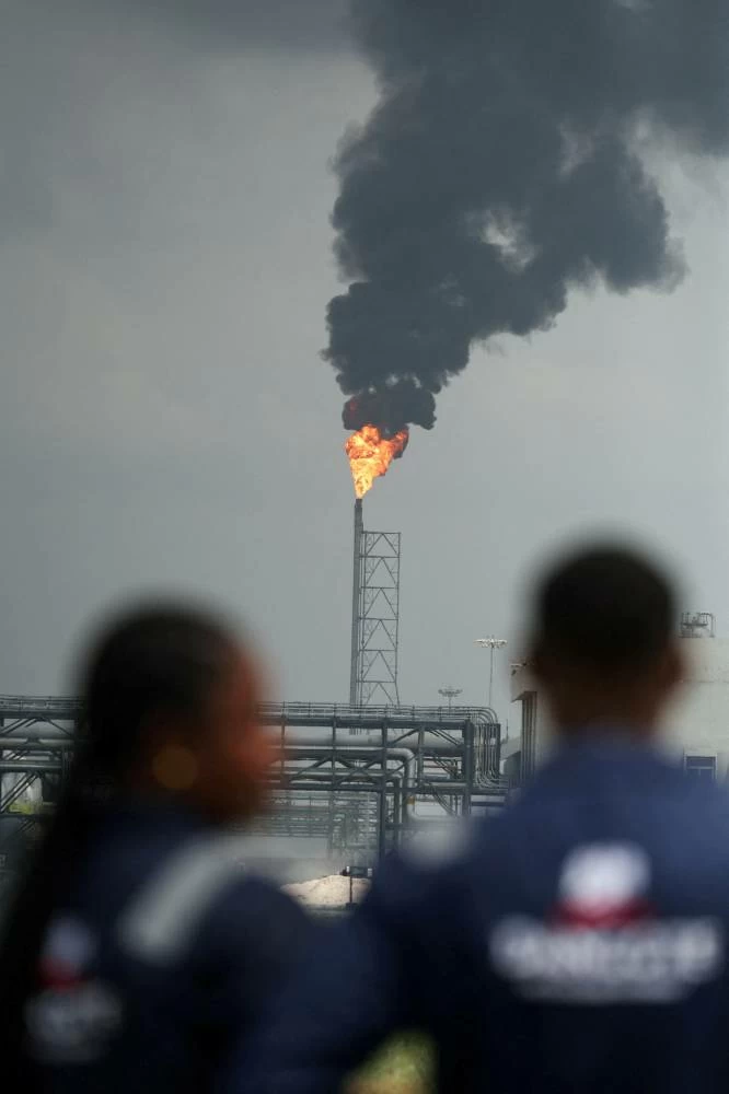 FILE PHOTO: A flame rises from a gas flare at the Dangote Industries oil refinery and fertilizer plant site in the Ibeju Lekki district of Lagos, Nigeria March 2, 2026. REUTERS