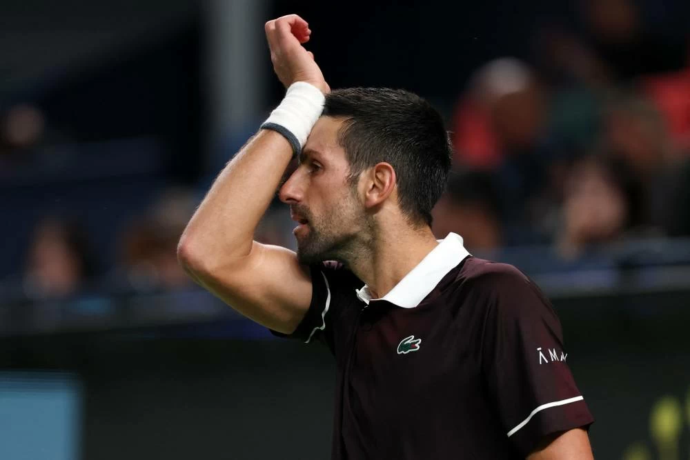 Serbia's Novak Djokovic reacts during his round of 64 match against Poland's Hubert Hurkacz. (Reuters)