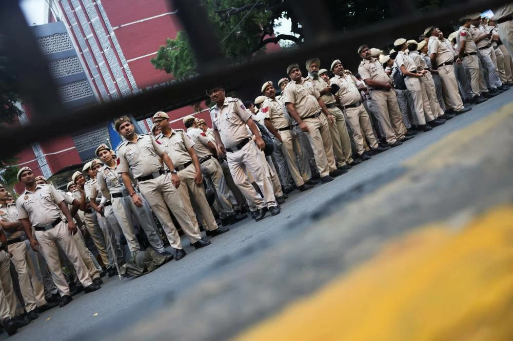 Security personnel stand guard outside the headquarters of the Election Commission of India on the day of a Cockroach Janta Party (CJP) protest seeking the resignation of India's Chief Election Commissioner, Gyanesh Kumar, in New Delhi, India, October 10, 2026. (Reuters)