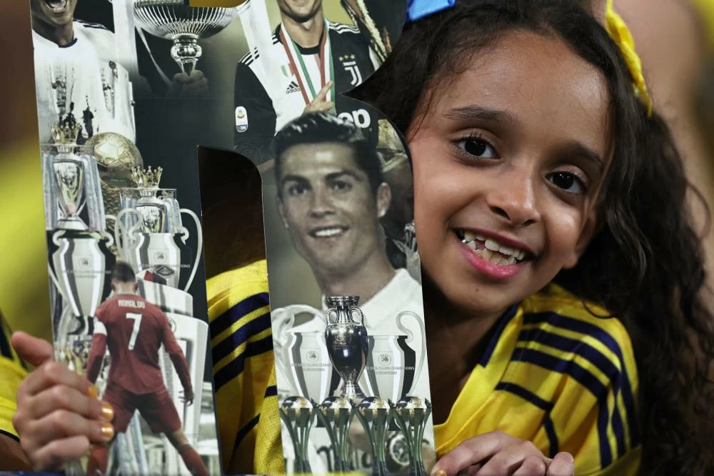Al Nassr fans display a banner of Cristiano Ronaldo inside Al Awwal Park before the Saudi Pro League match between Al Nassr and Al Diriyah in Riyadh, Saudi Arabia, on October 9, 2026. (Reuters)