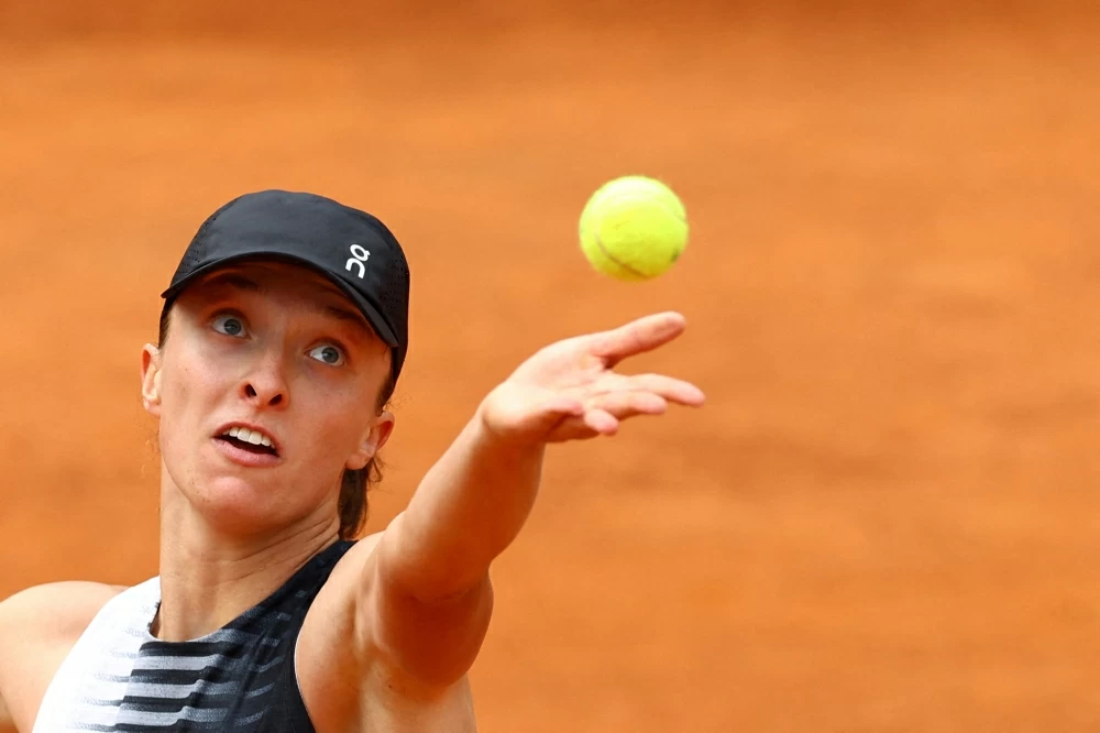 Swiatek defeats Frech 6-2, 6-1 to reach the final 16 at the WTA's Wuhan Open