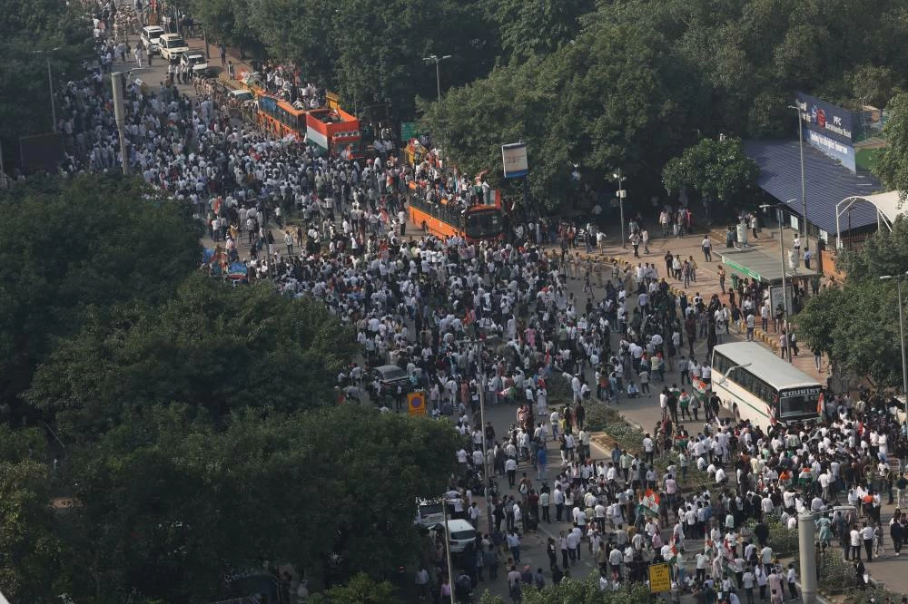 Supporters of the opposition parties march to the Supreme Court in protest against a controversial revision of voter lists that has sparked days of unrest, in New Delhi, India, October 12, 2026. (Reuters)
