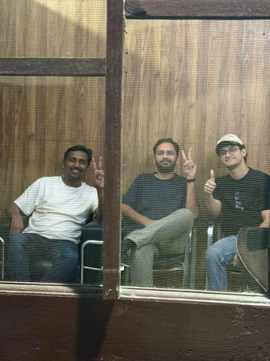 Saurav Das, chief spokesperson of the Cockroach Janta Party (CJP), Ashutosh Ranka, co-convenner of CJP, and Ajinkya Shinde pose for a picture from, what the party says, inside the Parliament Street Police Station at a location given as New Delhi, India, in this handout image released on October 14, 2026. Cockroach Janta Party's Legal Affairs head, Ratna Singh via X/Handout via REUTERS THIS IMAGE HAS BEEN SUPPLIED BY A THIRD PARTY. NO RESALES. NO ARCHIVES. MANDATORY CREDIT. VERIFICATION: -Reuters was not able to independently verify the date and location of footage -Cockroach Janta Party's Founder retweeted image posted by Ratna Singh released in early hours of October 14, 2026 -Names of individuals in photo (from left) Ajinkya Shinde, Ashutosh Ranka and Saurav Das