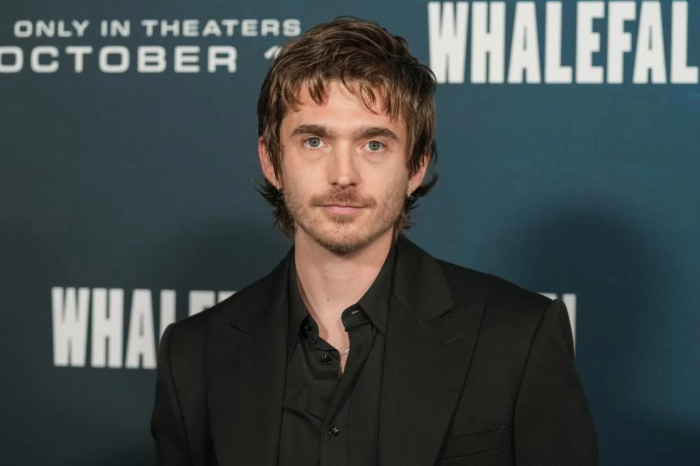 Austin Abrams arrives at the premiere of "Whalefall" on Tuesday, Oct. 13, 2026, at the El Capitan Theatre in Los Angeles. (AP)