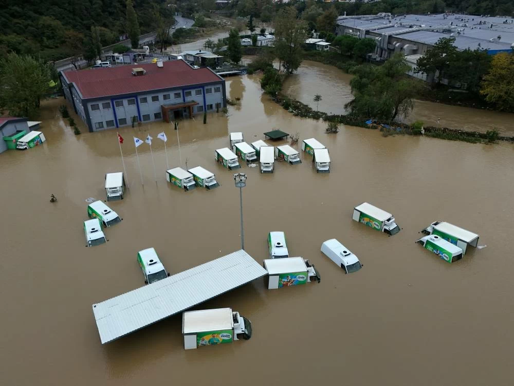 A drone view shows partially submerged lorries on a flooded street after heavy rains in Istanbul, Turkey, October 15, 2026. (Reuters)