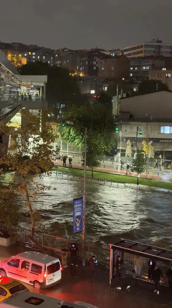 A creek overflows after heavy rainfall in Istanbul, Turkey, October 14, 2026, in this screengrab from a video obtained from social media. (Reuters)