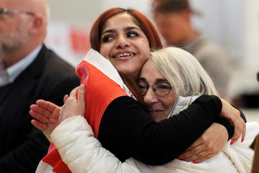 Supporters of the Forever Canadian group, who want Alberta to remain in Canada, react as they watch the results of a non-binding referendum on Alberta sovereignty in Edmonton, Alberta, Canada October 19, 2026. (Reuters)