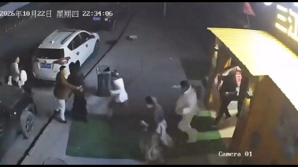 People evacuate from a building during an earthquake in Nagqu, Tibet Autonomous Region, China, October 22, 2026, in this still image from surveillance camera footage obtained from social media. (Reuters)