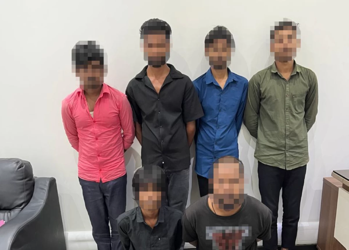 UAE woman woke up to find money missing from her account - Dubai Police arrested the six-person gang behind it
