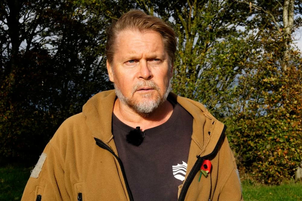 British adventurer Karl Bushby pauses during his walk near Market Rasen, Lincolnshire, England, Wednesday, Oct. 28, 2026, on the final stretch of his 28-year walk around the world to get back to his mother's home in Hull. (AP)